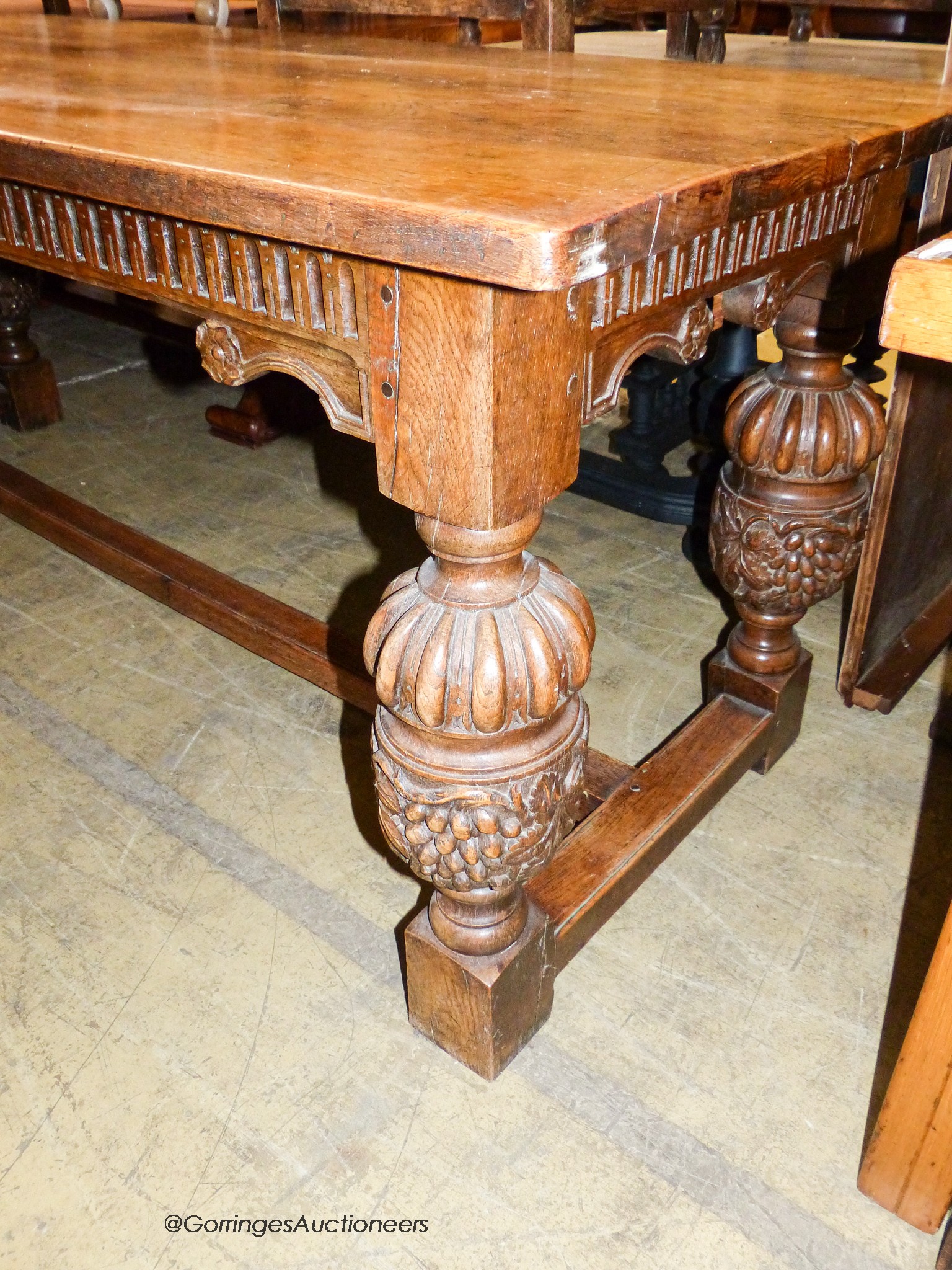 An Elizabethan style rectangular oak refectory dining table, width 198cm, depth 77cm, height 78cm